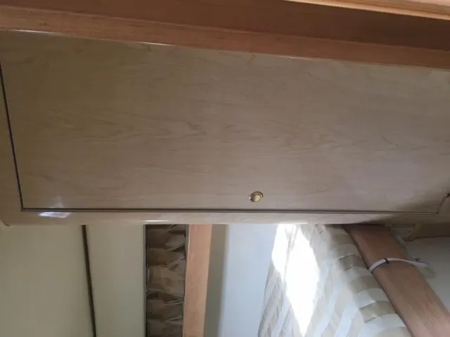 Slide: The Image of Interior of a 2002 Fountain 38 Express Cruiser. - 24