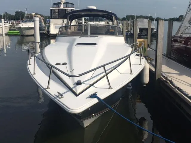 Slide: The Image of 2002 Fountain 38 Express Cruiser docked at marina. - 3