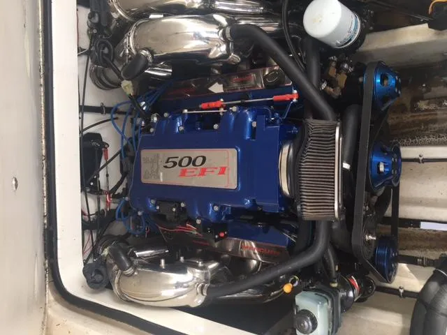 Slide: The Image of Engine of a 2002 Fountain 38 Express Cruiser boat. - 37