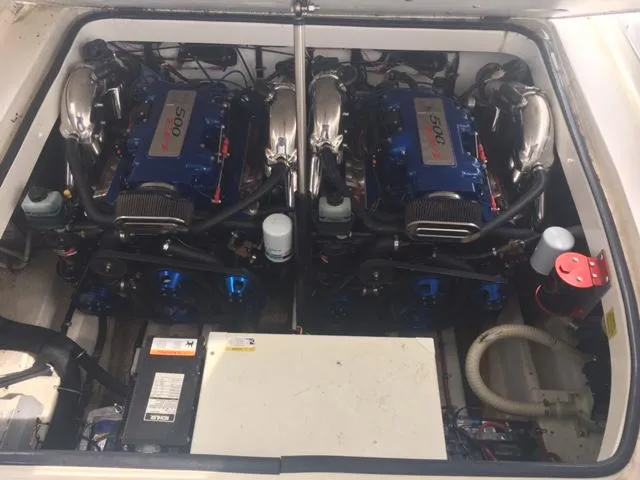 Slide: The Image of Engine compartment of a 2002 Fountain 38 Express Cruiser with dual engines. - 39