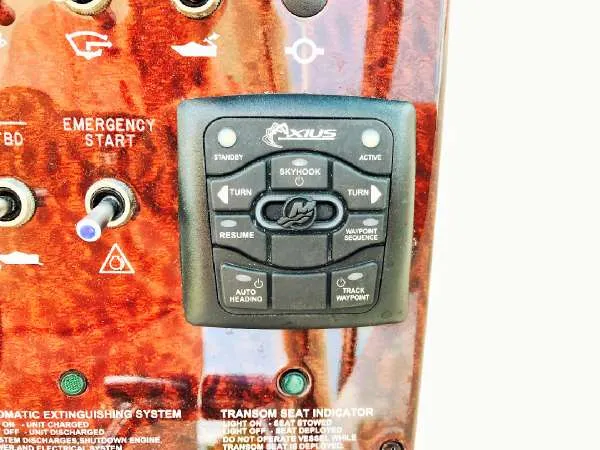 Slide: The Image of Control panel of a 2013 Sea Ray 310 Sundancer boat with Axius system. - 20