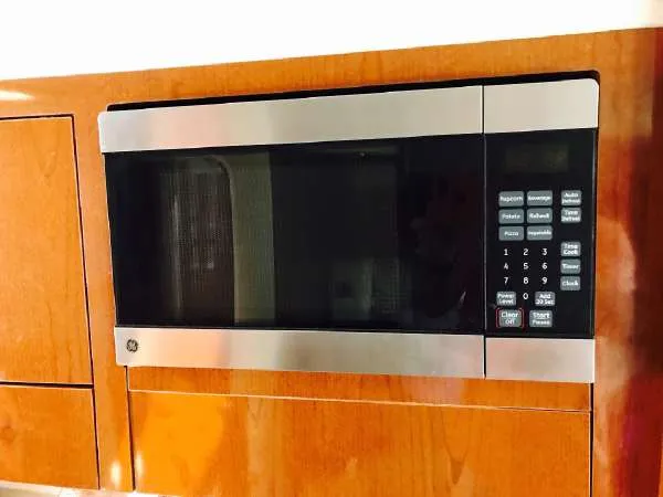 Slide: The Image of Built-in microwave in 2013 Sea Ray 310 Sundancer yacht kitchen. - 37