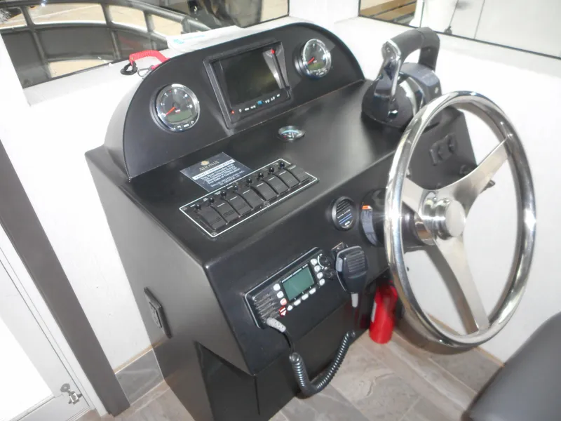 Slide: The Image of Steering console of 2017 Adonia Liquidity Trip 5 with gauges and controls. - 11