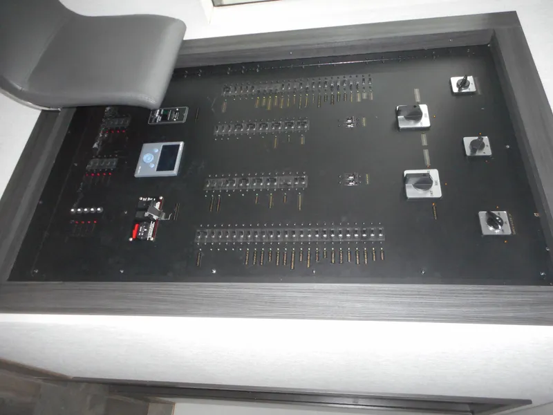 Slide: The Image of Control panel of Adonia Liquidity Trip 5, 2017 model, featuring switches and dials. - 12