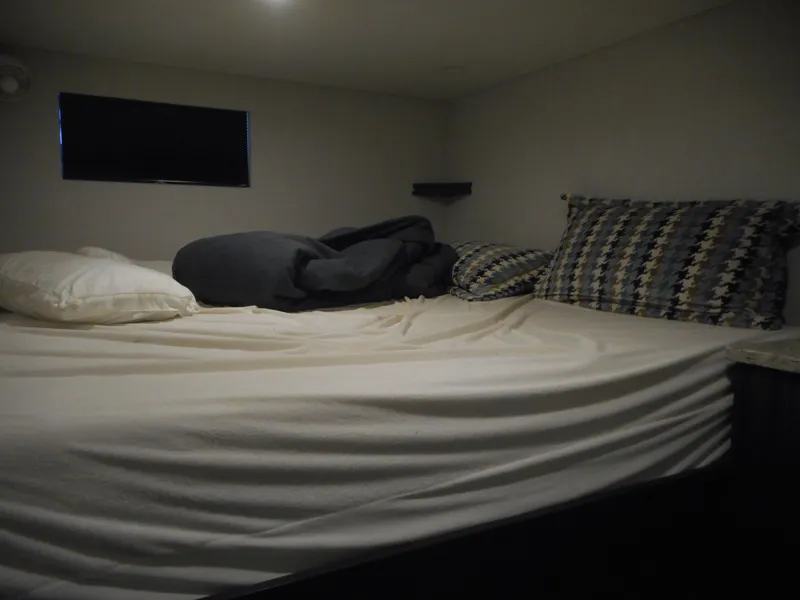 Slide: The Image of Cozy bed inside 2017 Adonia Liquidity Trip 5 RV with pillows and blanket. - 21