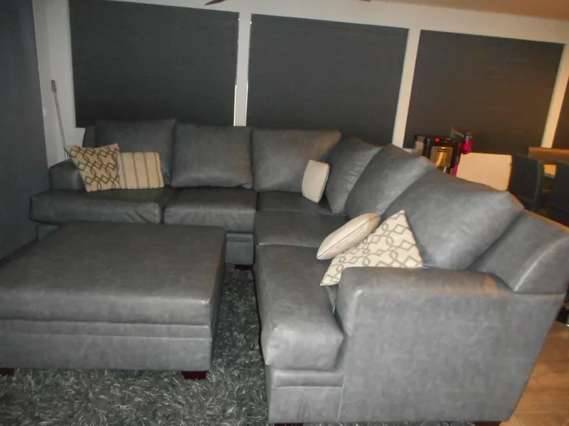 Slide: The Image of Gray sectional sofa with patterned cushions, Adonia Liquidity Trip 5, 2017 model, in a cozy living room. - 31