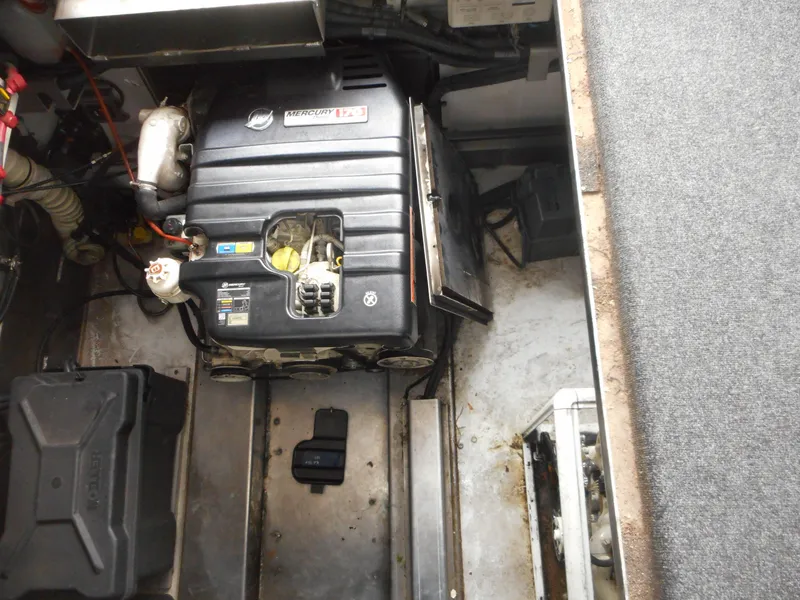 Slide: The Image of Engine compartment of 2017 Adonia Liquidity Trip 5 boat, showcasing mechanical components. - 33