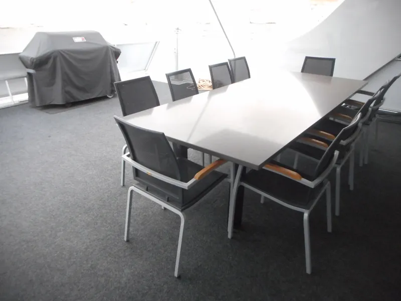 Slide: The Image of Outdoor dining area with modern table and chairs on Adonia Liquidity Trip 5, 2017. - 34