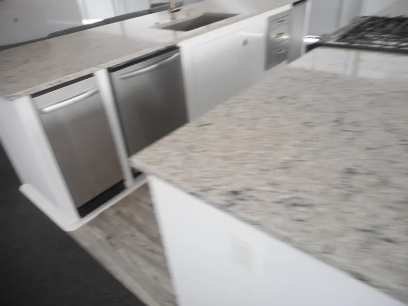 Slide: The Image of Modern kitchen with granite countertops and stainless steel appliances in Adonia Liquidity Trip 5, 2017. - 42