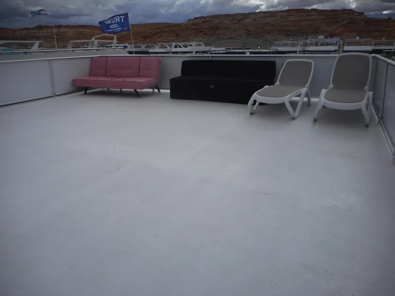 Slide: The Image of Rooftop deck of 2017 Adonia Liquidity Trip 5 with seating and loungers. - 43