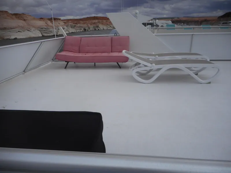 Slide: The Image of Upper deck of Adonia Liquidity Trip 5 yacht with pink sofa and lounge chair, 2017. - 44
