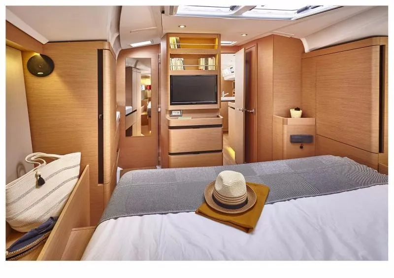 Slide: The Image of Luxurious interior of 2024 Jeanneau Sun Odyssey 490 yacht with modern amenities. - 11