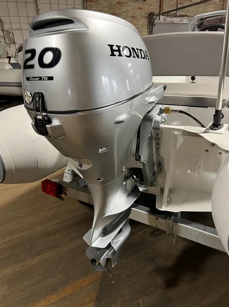 Slide: The Image of Honda 20HP outboard motor on a 2023 Gala A330L inflatable boat. - 10