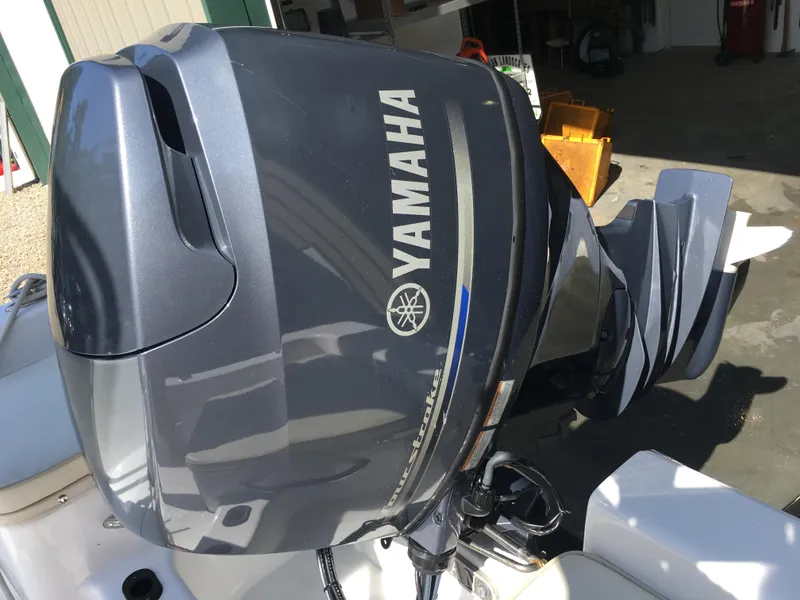 Slide: The Image of Yamaha outboard motor on 2018 Sportsman Island Reef 19 Center Console boat. - 7
