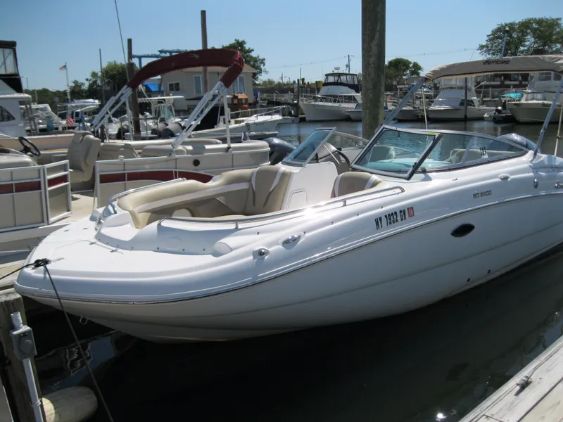 The Image of 2017 Hurricane FunDeck GS 248 OB boat docked at marina. - 1