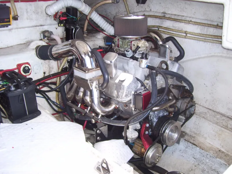 Slide: The Image of 2002 Mares 38 High Performance engine with TRL, featuring chrome components and wiring. - 22