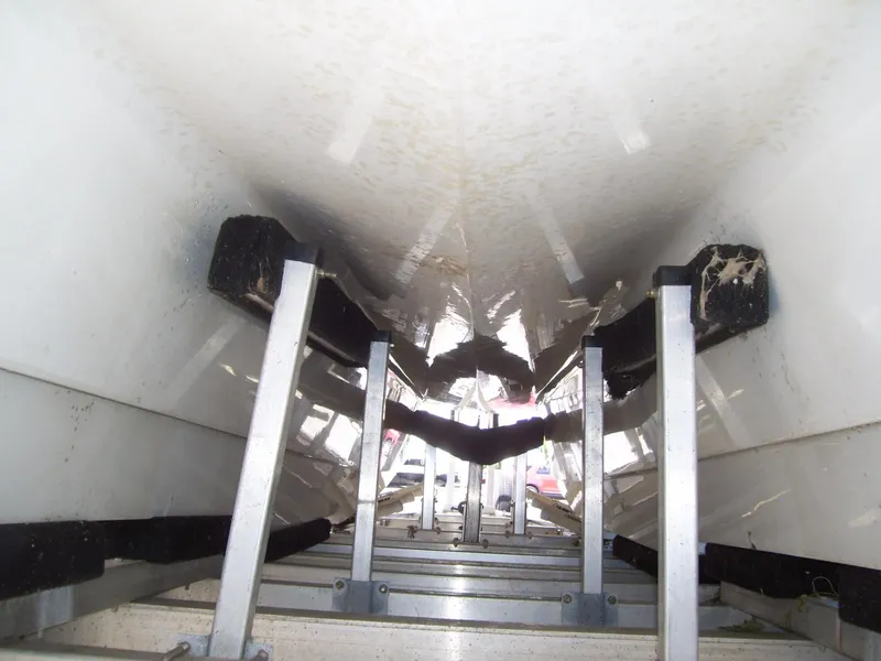 Slide: The Image of Underside view of 2002 Mares 38 High Performance boat on trailer. - 3