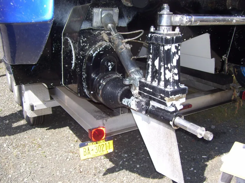 Slide: The Image of 2002 Mares 38 High Performance boat with trailer, showing propeller and drive system. - 8