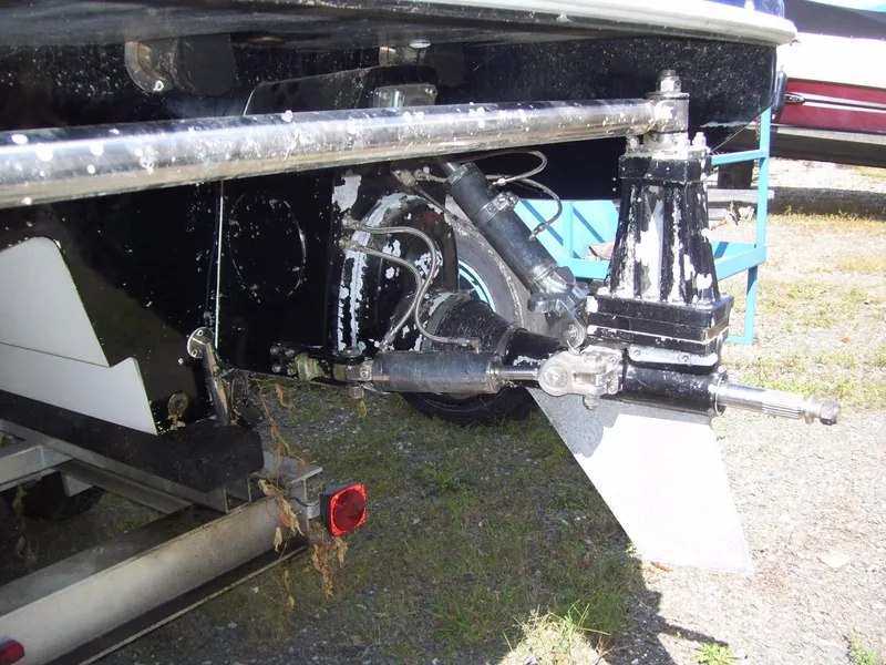 Slide: The Image of Rear view of a 2002 Mares 38 High Performance boat with trailer attachment. - 9