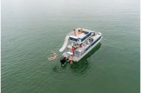 Slide: The Image of 2021 Avalon Catalina Platinum Cruise Funship with slide on the water. - 4