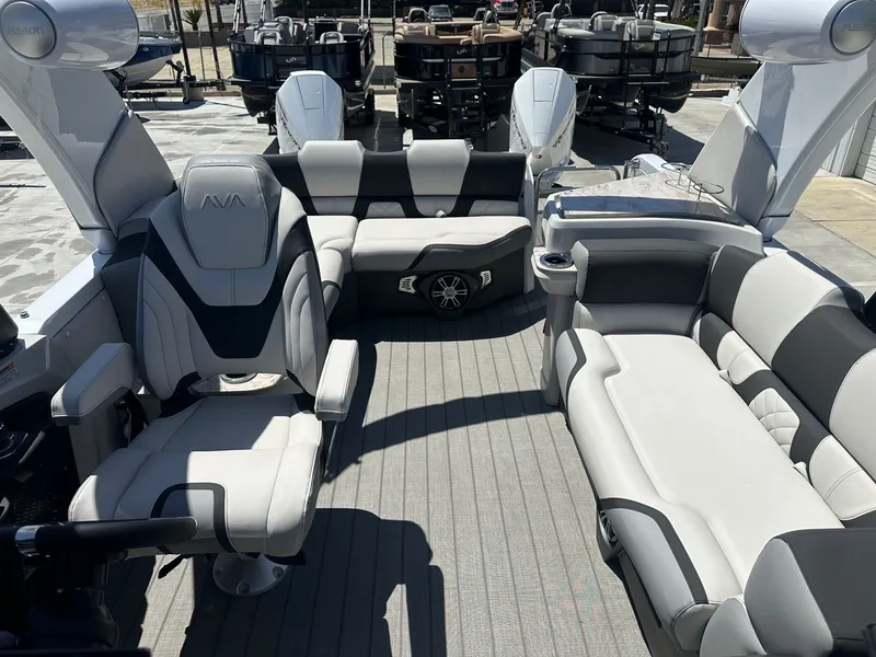 Slide: The Image of 2021 Monterey M6 boat with 8.2L engine, 380HP, on trailer. - 13