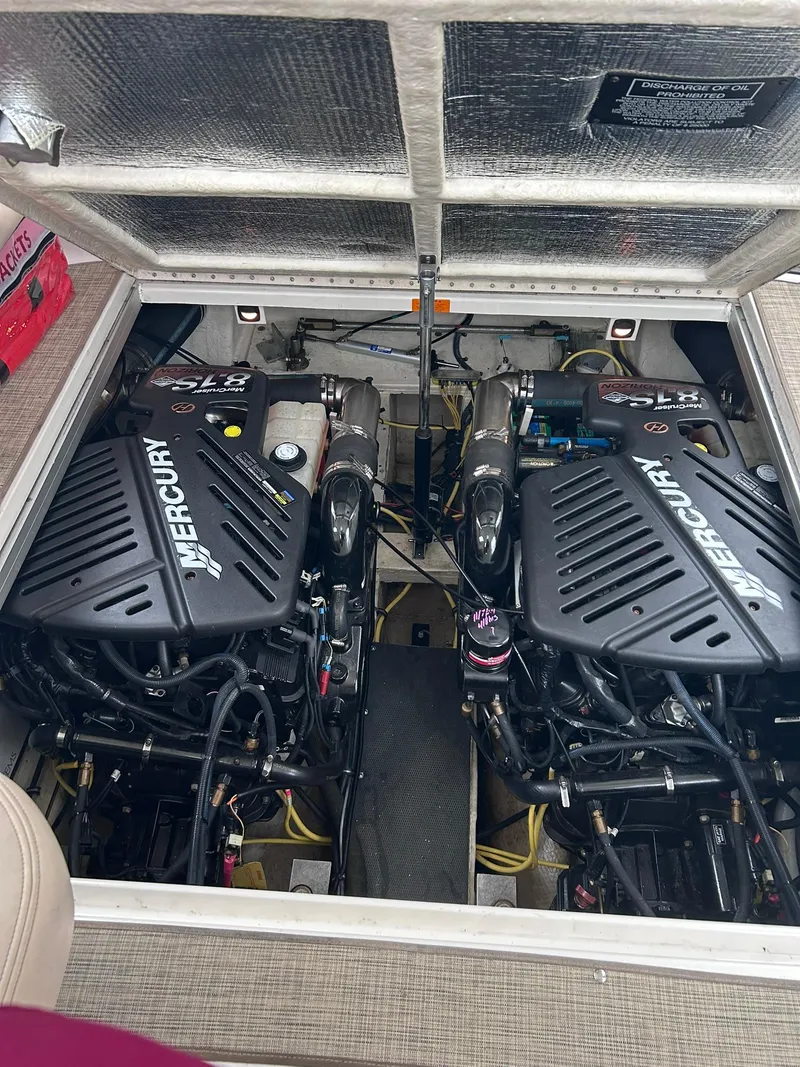 Slide: The Image of Engine compartment of 2007 Chaparral 350 Signature with dual Mercury engines. - 16
