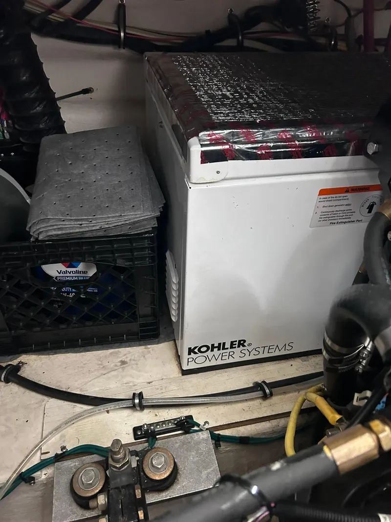 Slide: The Image of Engine room of 2007 Chaparral 350 Signature with Kohler power system and Valvoline products. - 17