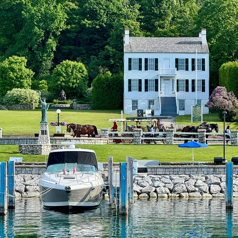 Slide: The Image of Chaparral 350 Signature 2007 docked near historic house and horse-drawn carriage. - 3