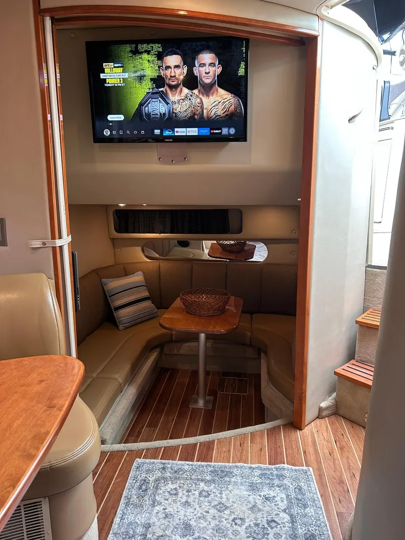 Slide: The Image of Interior of 2007 Chaparral 350 Signature yacht with cozy seating and TV. - 30