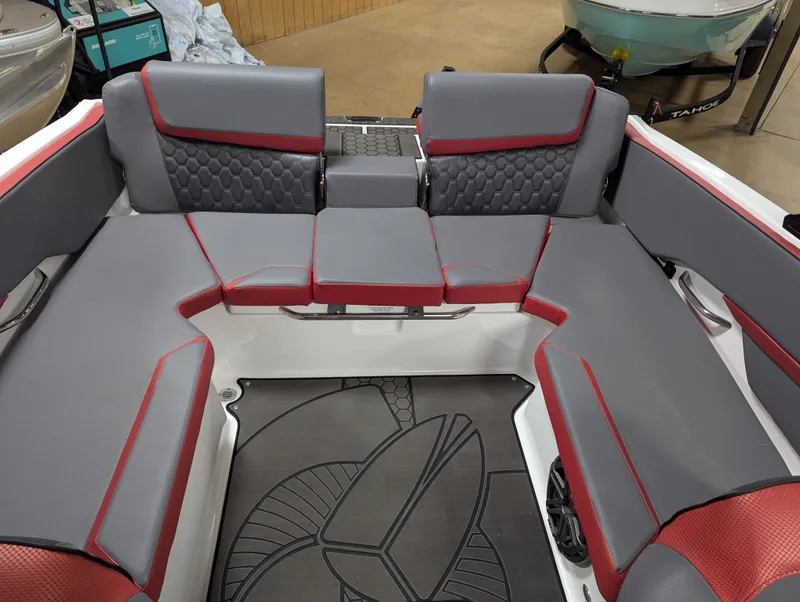 Slide: The Image of Interior of 2025 Scarab 215LX with gray and red seating. - 10
