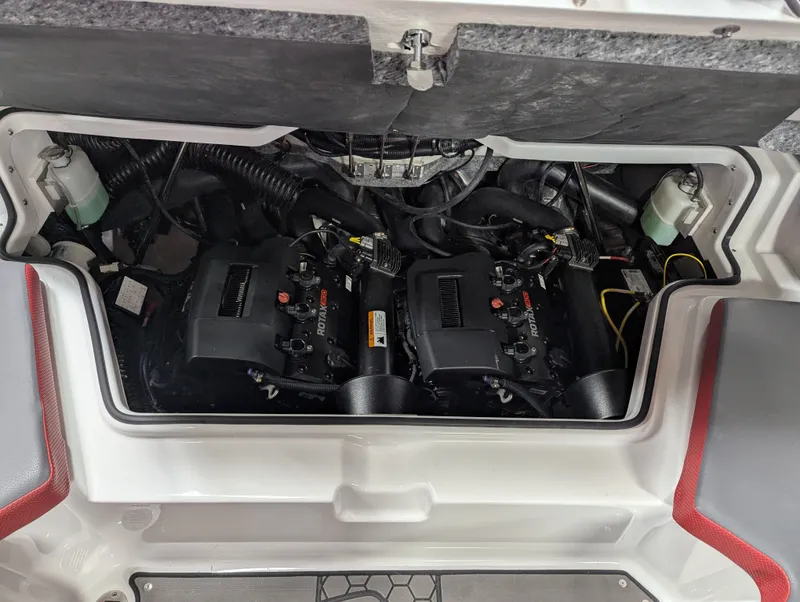 Slide: The Image of Engine compartment of 2025 Scarab 215LX with Rotax engines. - 11