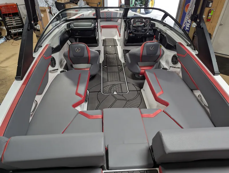 Slide: The Image of Interior of 2025 Scarab 215LX with gray and red seating. - 3