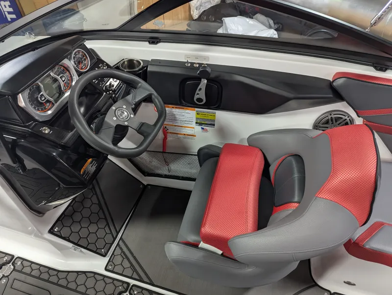 Slide: The Image of Interior of 2025 Scarab 215LX with red and gray seating. - 5