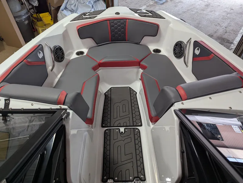 Slide: The Image of Interior of 2025 Scarab 215LX with gray and red seating. - 8