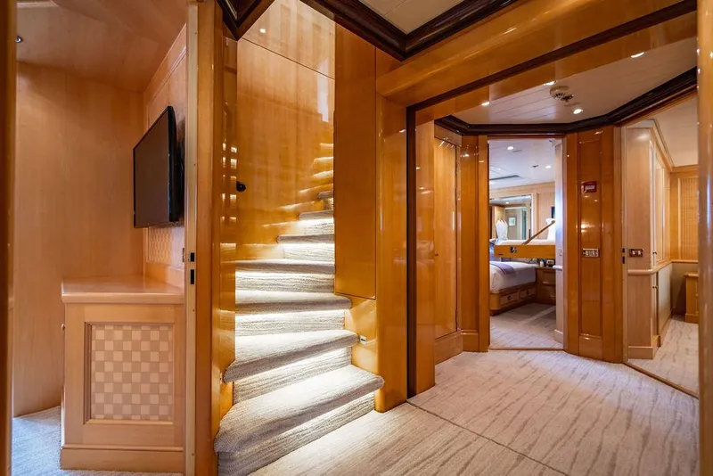 Slide: The Image of Luxurious interior of 2004 Amels Oceangoing yacht with elegant staircase and modern design. - 12