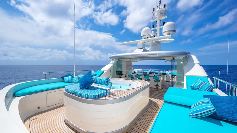 Slide: The Image of Luxurious 2004 Amels Oceangoing yacht deck with jacuzzi and ocean view. - 29