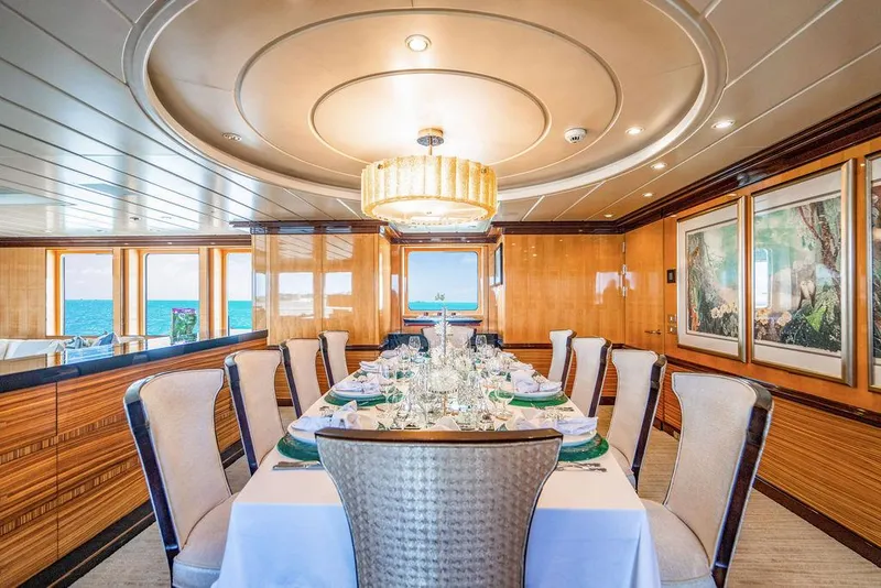 Slide: The Image of Luxurious dining room on 2004 Amels Oceangoing yacht with elegant decor and ocean views. - 5