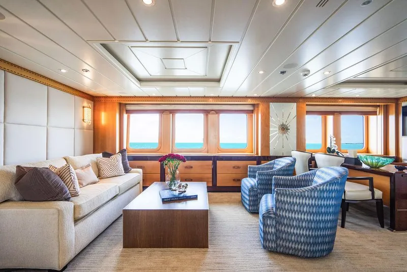Slide: The Image of Luxurious interior of 2004 Amels Oceangoing yacht with elegant seating and ocean views. - 8
