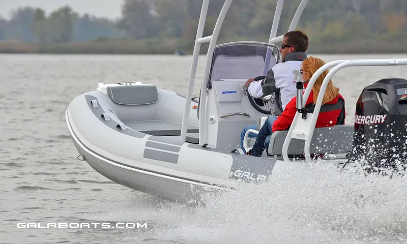 Slide: The Image of 2024 Gala VIKING V500 boat cruising on water with passengers. - 12