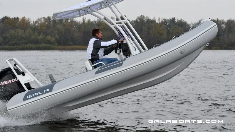 Slide: The Image of 2024 Gala VIKING V500 boat in action on the water. - 13