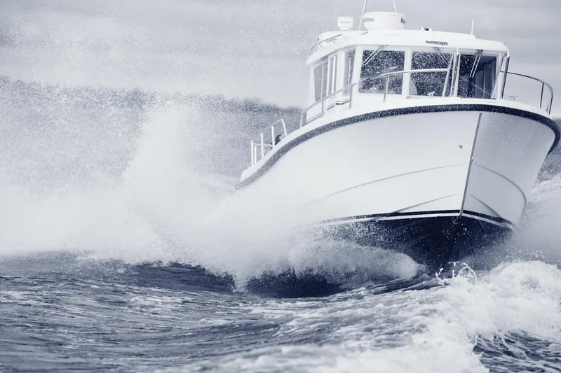 Slide: The Image of 2024 Sargo 28 boat navigating through waves. - 31