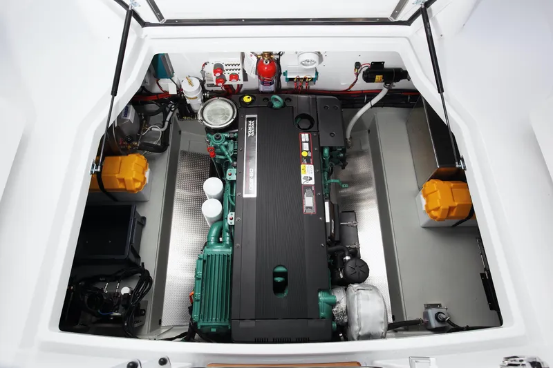 Slide: The Image of Engine compartment of a 2024 Sargo 28 boat with a Volvo Penta engine. - 44