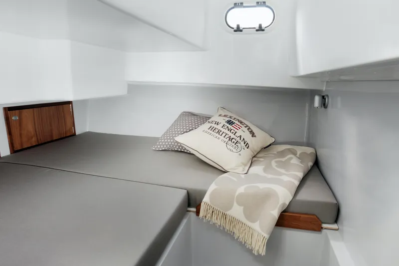 Slide: The Image of Interior of 2024 Sargo 28 yacht with cozy bed and cushions. - 46
