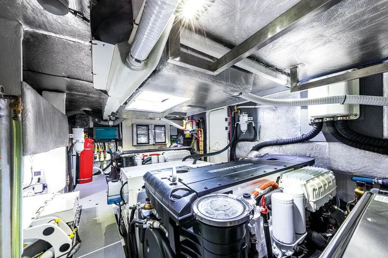 Slide: The Image of Engine room of 2025 Absolute NAVETTA 52 yacht, showcasing advanced machinery and equipment. - 23