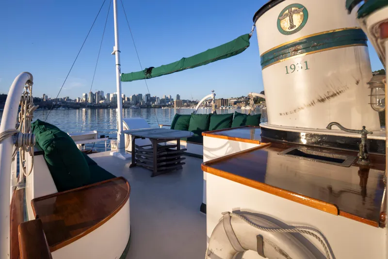 Slide: The Image of Luxurious 1931 Boeing Custom yacht deck with city skyline view. - 19
