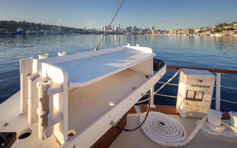 Slide: The Image of Boat deck view with city skyline, featuring a 1931 Boeing Custom model. - 25