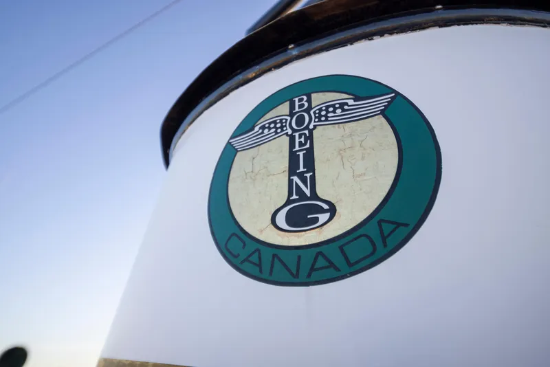 Slide: The Image of Boeing Canada logo on vintage 1931 aircraft, featuring classic design elements. - 30