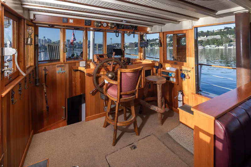 Slide: The Image of Vintage 1931 Boeing Custom boat interior with wooden helm and panoramic windows. - 33