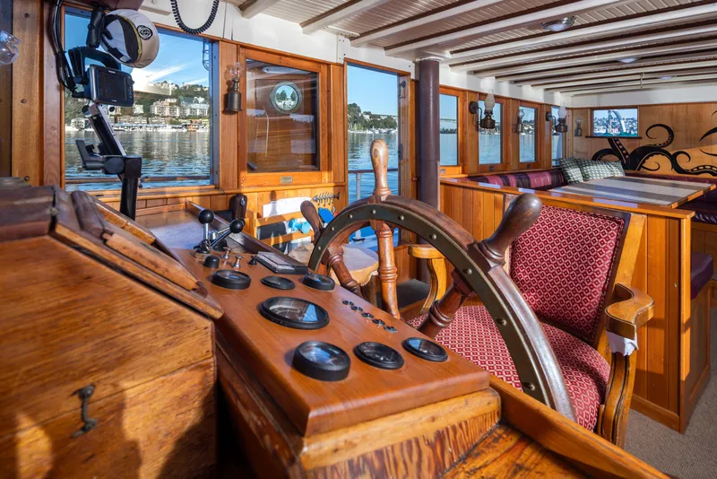 Slide: The Image of Vintage 1931 Boeing Custom boat interior with wooden helm and classic nautical design. - 34