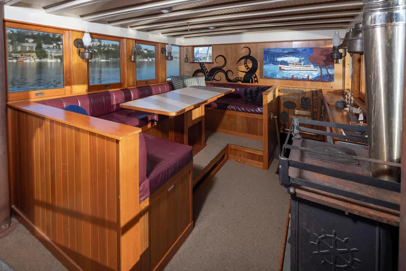 Slide: The Image of Interior of a vintage 1931 Boeing Custom boat with wooden seating and nautical decor. - 40
